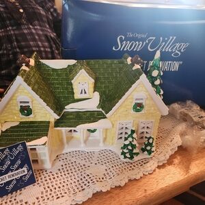 Department 56 Snow Village House Natucket Renovawith Green Roof and Yellow Walls